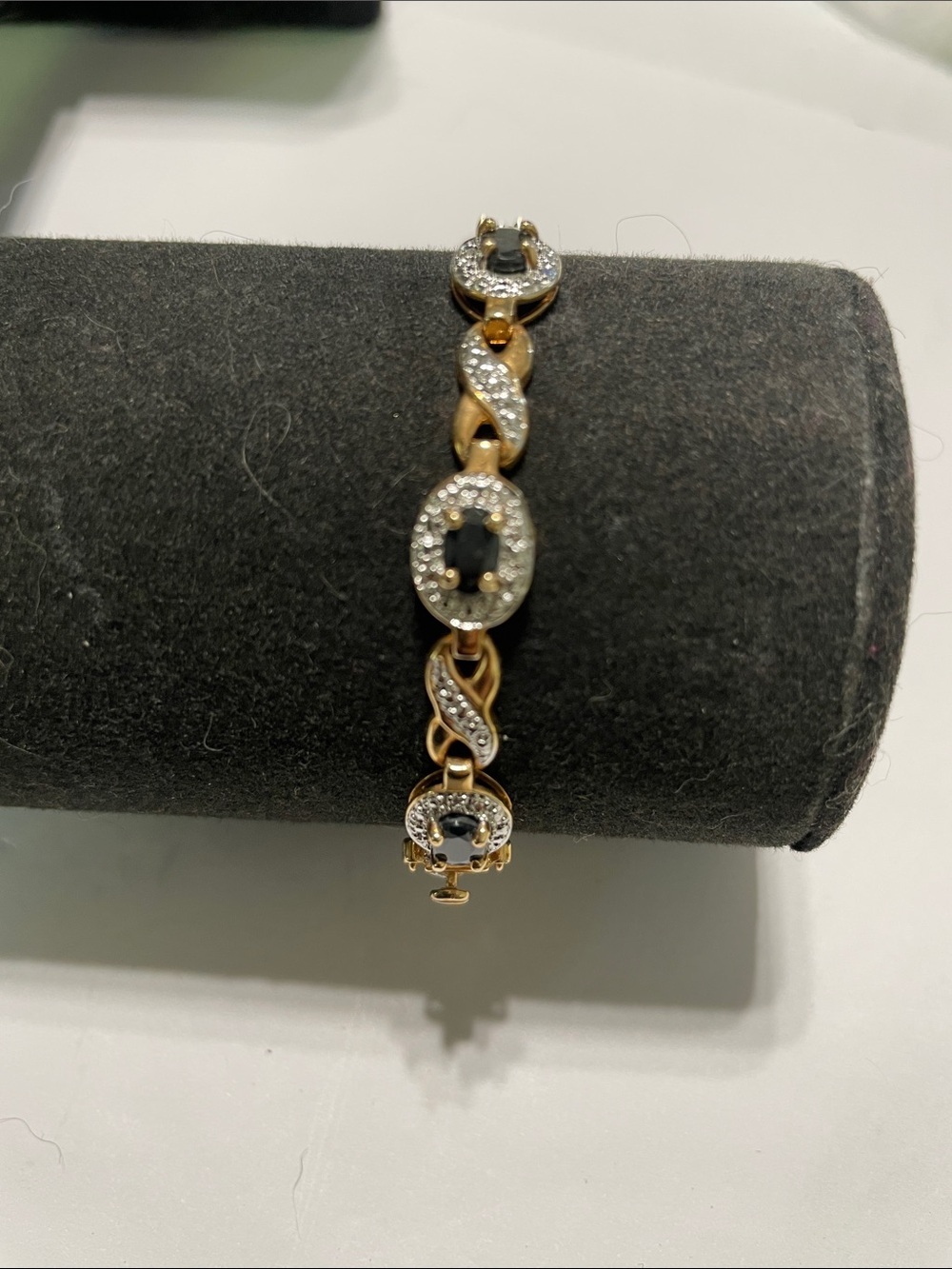 Gold Tone Black Stone and Crystal Link Bracelet. 9/6/6